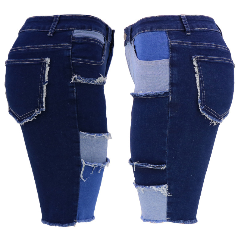Comercio exterior nueva personalidad transfronteriza moda de cinco puntos Denim pantalones de mujer nuevos pantalones de patchwork de levantamiento de cadera elástica alta 2023 verano de mujer