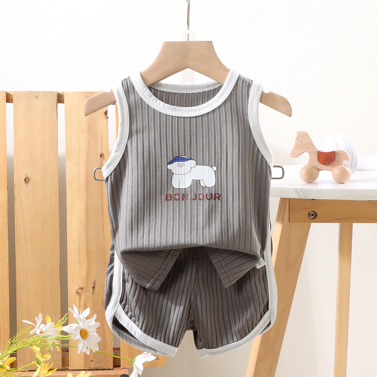 Nueva ropa para niños niñas verano cuello redondo sin mangas camiseta niños chaleco estampado de dibujos animados bebé verano estilo occidental top