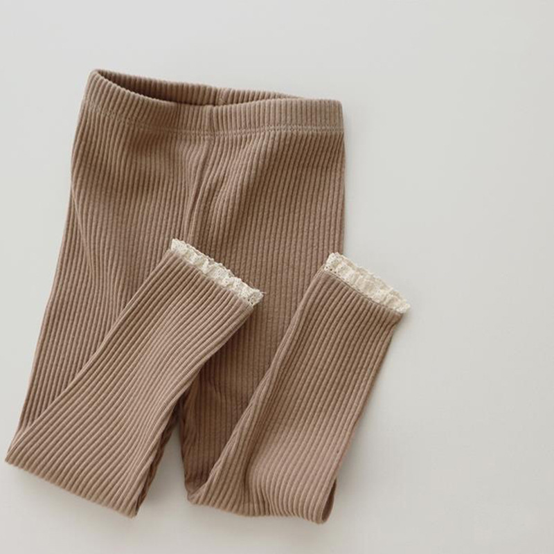 Pantalones de algodón para niños de comercio exterior de estilo coreano pantalones de niñas primavera y otoño leggings elásticos altos pantalones de niña a rayas al por mayor