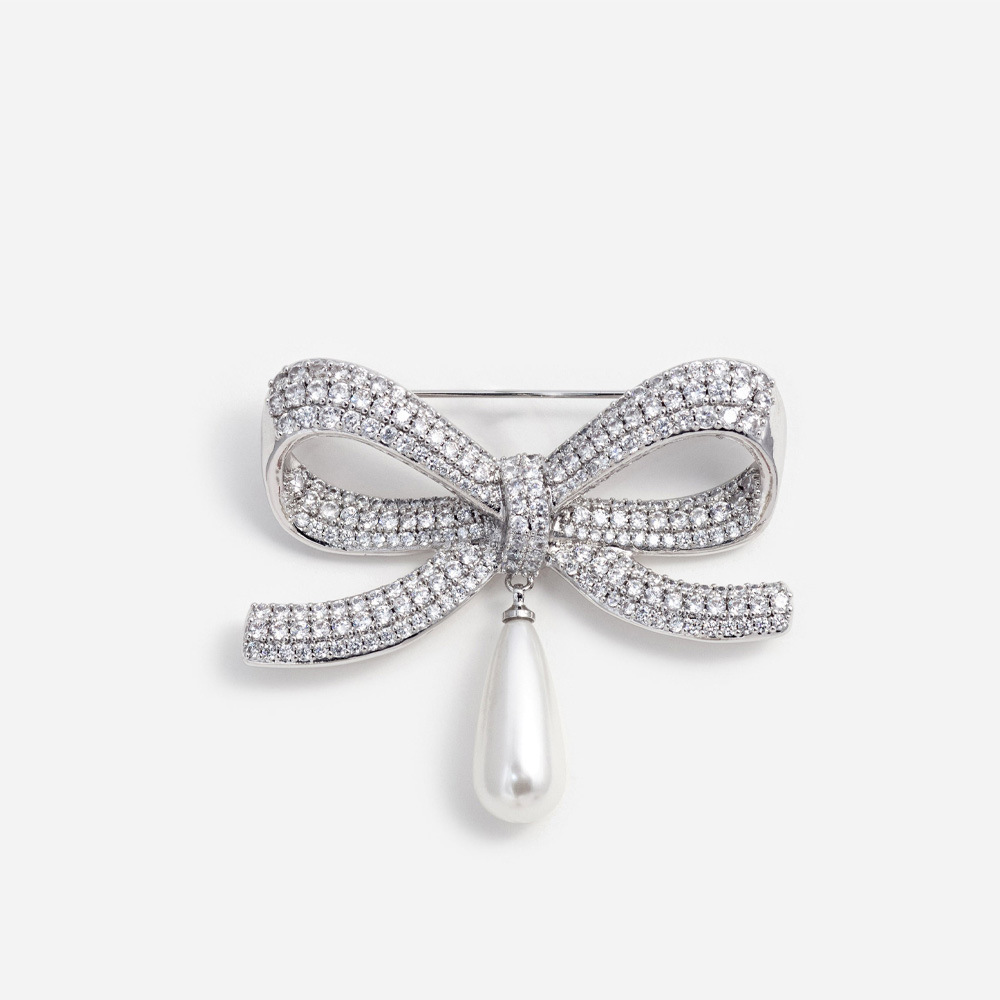 Europa y los Estados Unidos nuevos broches de arco con bordas trajes de diamante sofisticados accesorios de moda broche
