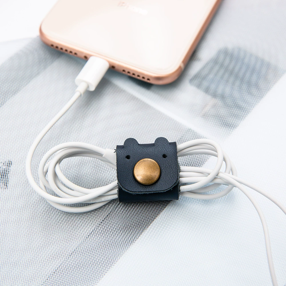 Leather storage system, headphones, belt, mobile phone, charging cable