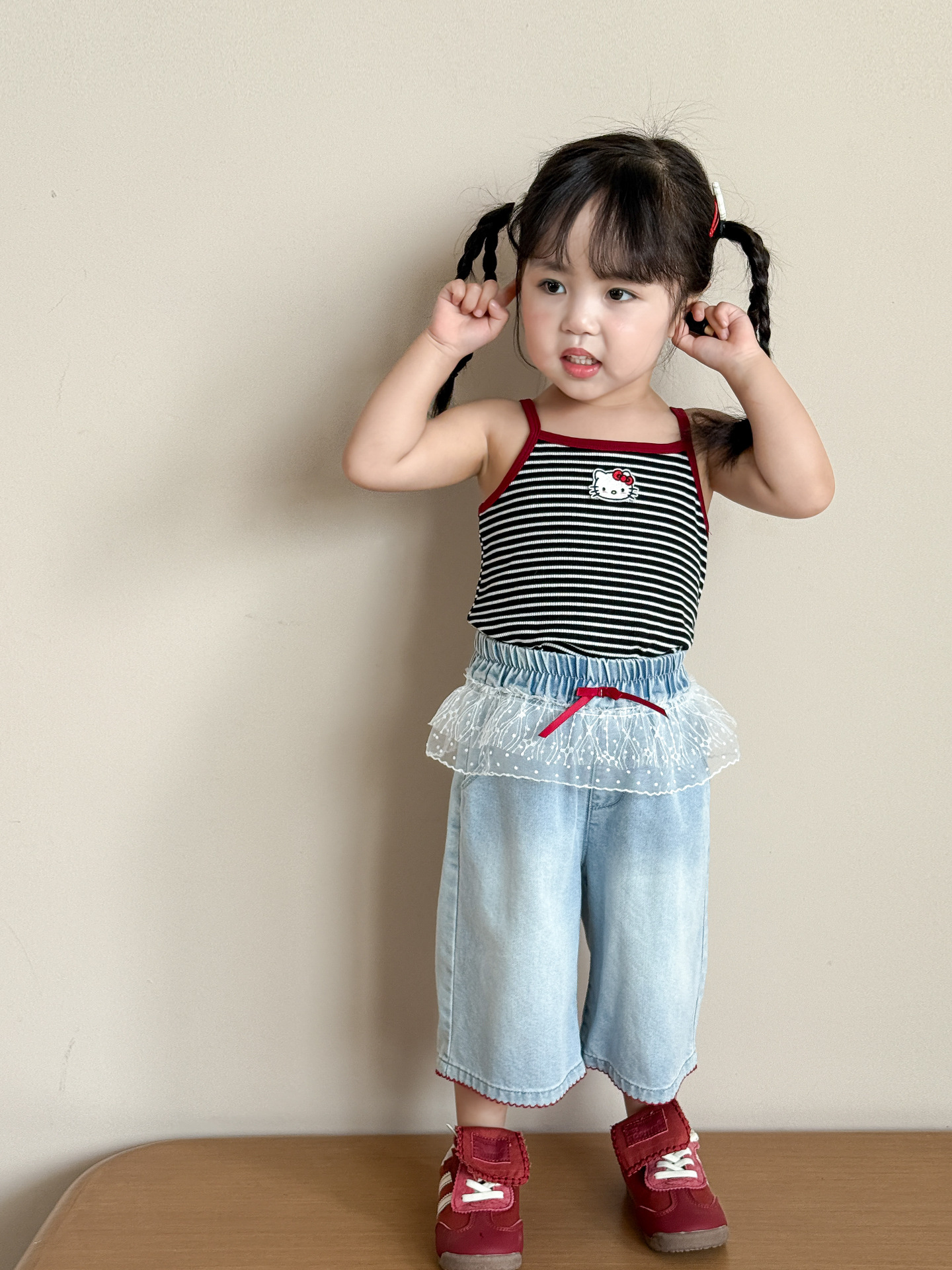 Caña de pera ropa para niños camisola para niñas estilo fino de verano 2025 nuevos tops a rayas de dibujos animados para niños ropa de bebé para niñas