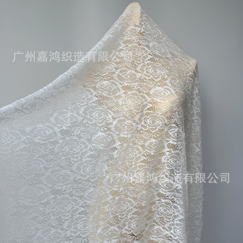 Tejido de encaje elástico de poliamonio 2026 tela de ropa de mujer para hacer falda, vestido, blusa, tela