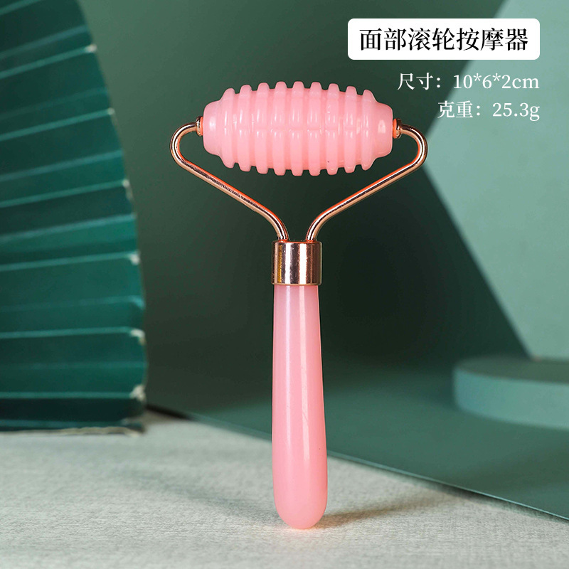 Rodillo facial de cristal en forma de corazón para masaje y lifting