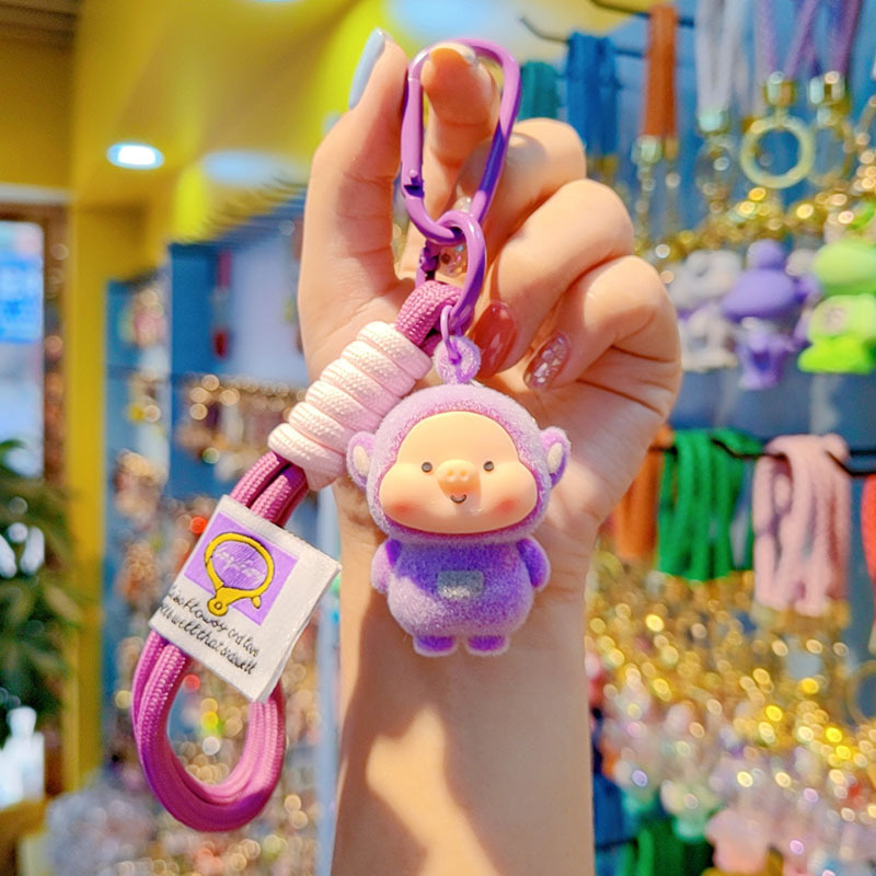 Antena de flojo de dibujos animados pareja llavero de coche creativo colgante de llave de bolsos de mujer colgante colgante al por mayor