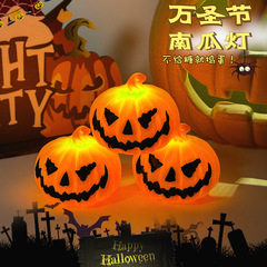 ハロウィーンのカボチャのランプは、ledが光る小さな夜のランプのデパートのバーのパーティーに雰囲気感のある装飾品を配置します