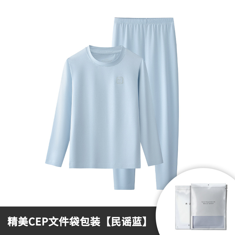 Conjunto de pantalones y tops térmicos finos de manga larga para niños y niñas de otoño e invierno de algodón modal, adecuado para salir o como pijama, color sólido, en stock.