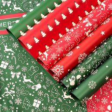 新款防水圣诞包装平安夜苹果包花纸鲜花礼品花束礼物包装纸批发