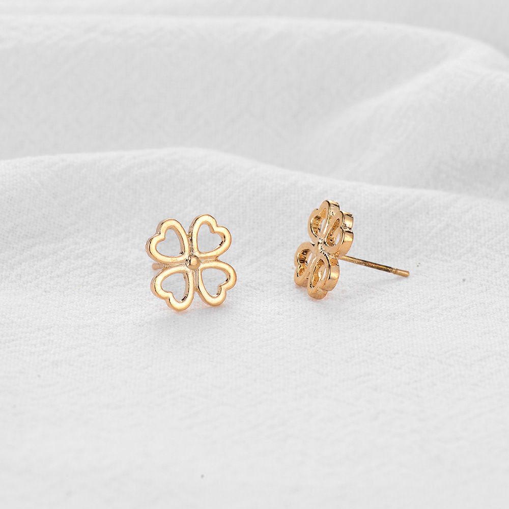 Simple Hollow Geometric Metal Heart Four-leaf Clover Earrings Wholesale Nihaojewelry display picture 7