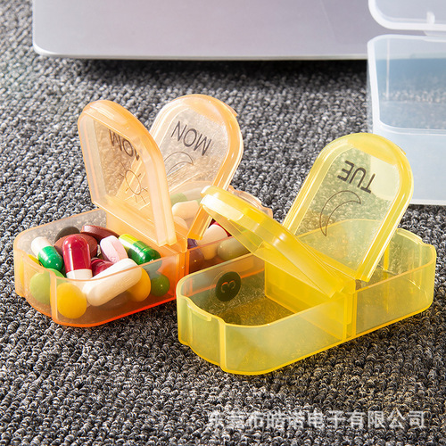 Pill organizer for 7 days 14 compartments, dustproof storage box, split into 7-day pill boxes for daily medication distribution.