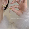 Asymmetrical earrings with tassels, diamond encrusted, simple and elegant design, light luxury style