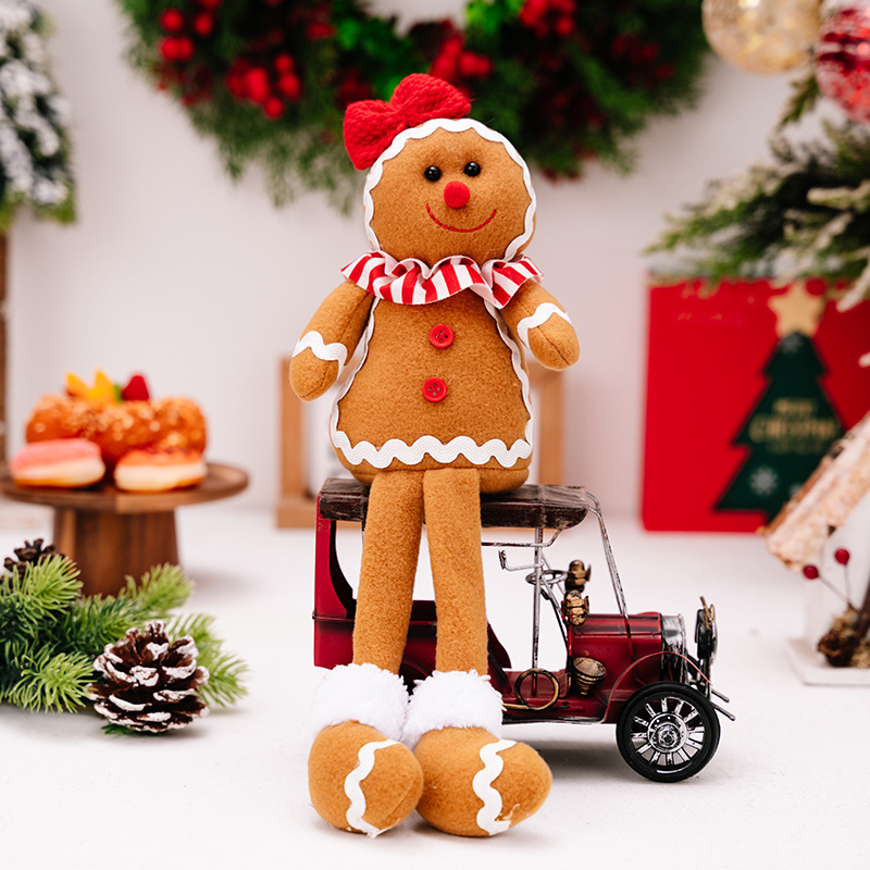 2種類のアマゾンの新しいクリスマスの姜パイ人は足の公仔のクリスマスのビスケット人を掛けてショーウインドーの雰囲気を飾っています。|undefined