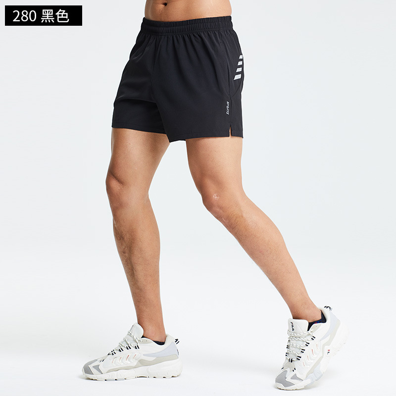 Verano maratón profesional de los hombres corriendo entrenamiento pantalones cortos deportivos de una sola capa de fitness ligero de secado rápido tres pantalones en stock