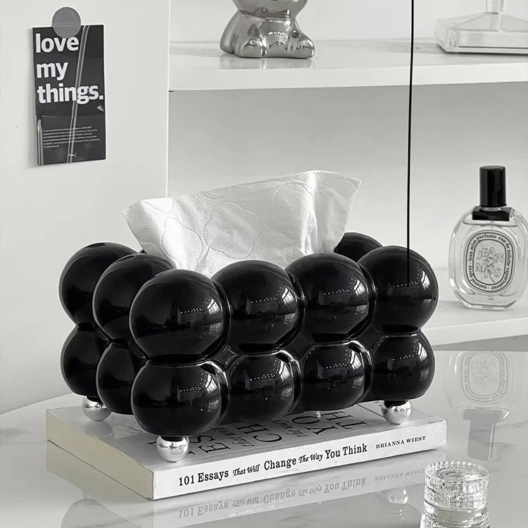 高級感のある収納ケースの新型の軽贅沢家庭用創意トイレティッシュボックスのリビングのテーブルの上に紙ナプキンを引き出します。