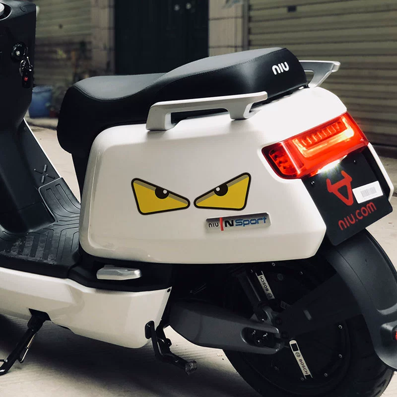Electric car, sticker, retroreflective helmet, nail decoration