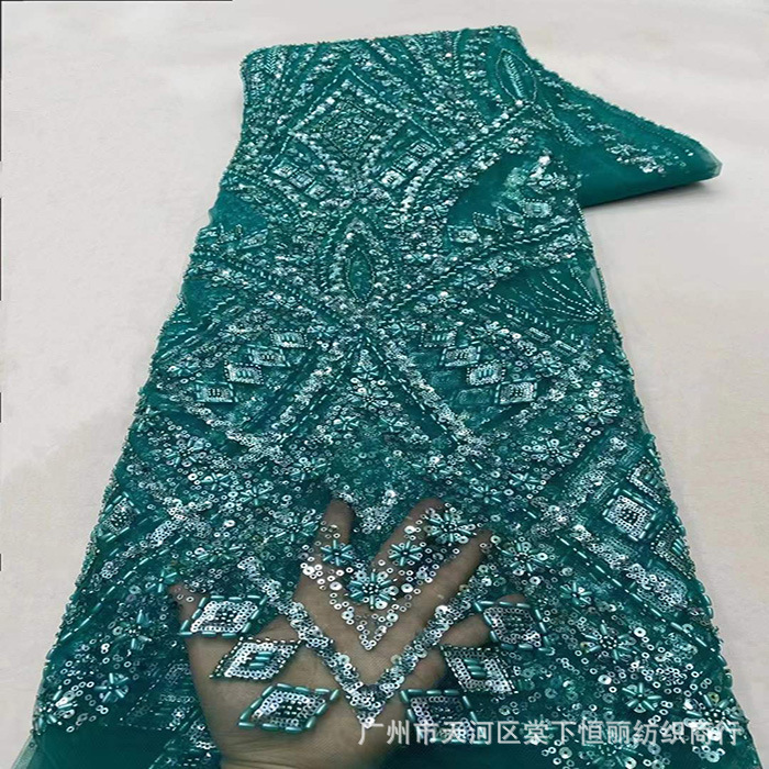 Vestido de boda negro de moda compuesto de clavos hechos a mano Europa y América bordado flor floral textil vestido bordado tela nueva