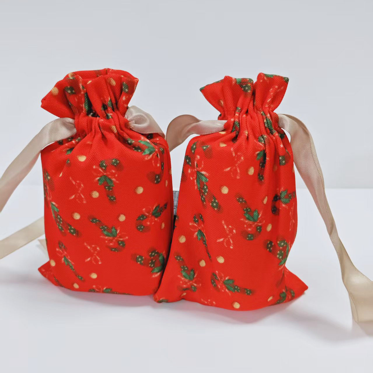 大红色喜庆帆布袋定制圣诞全涤礼品袋圣诞节派对礼物包装袋抽绳袋