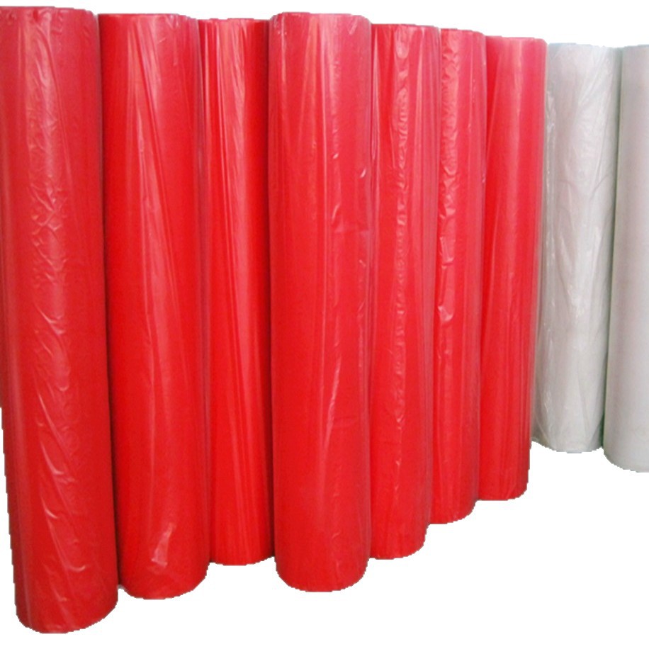 Fábrica de material PP no tejido spunbond rojo 80g 100g bolsa de almacenamiento de mano de compras no tejido rojo
