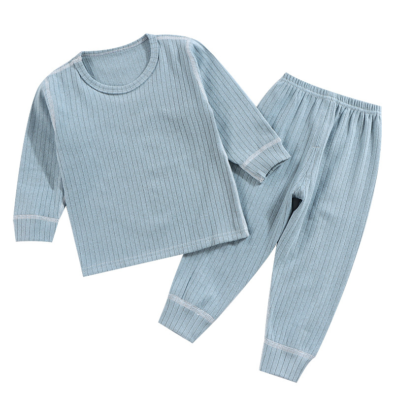 Camisa de fondo sin hueso para niños primavera y otoño ropa de otoño para niños medianos y grandes pantalones largos bebé ropa de hogar simple niños y niñas pijamas de cuello redondo