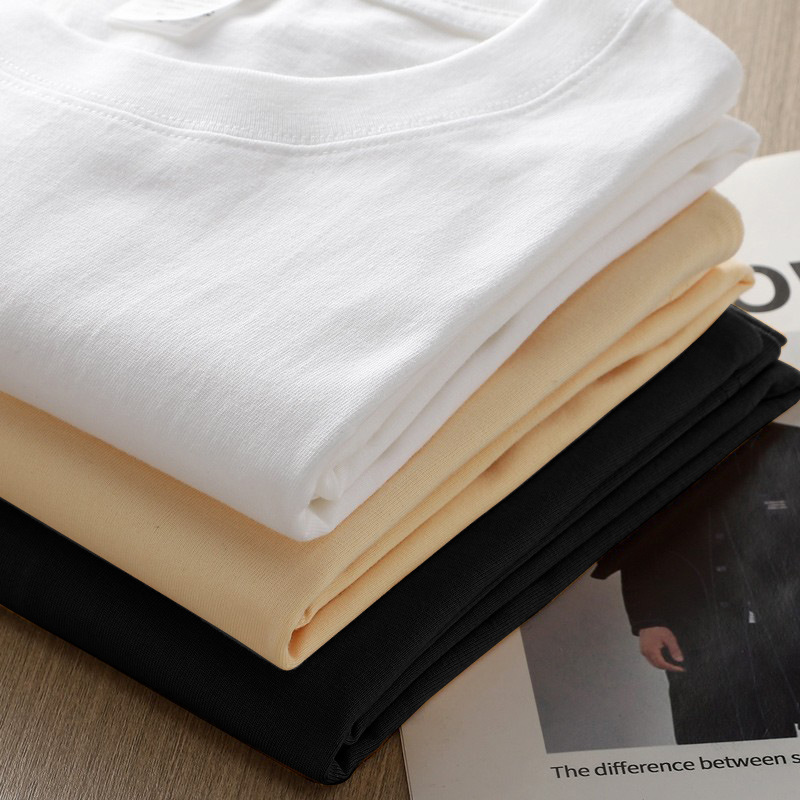 重いポンドの純綿の半袖のtシャツの女性の夏の新型の新疆の綿の純色のゆったりしている丸首の男女の同項のtシャツ|undefined