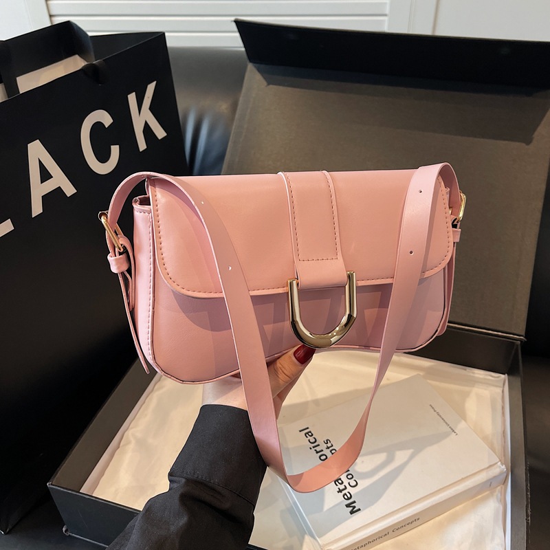 Nicho francés bolsos bajo la axila 2025, nuevo estilo de moda de verano, mochila de hombro, textura, bolsos de mujer elegante.