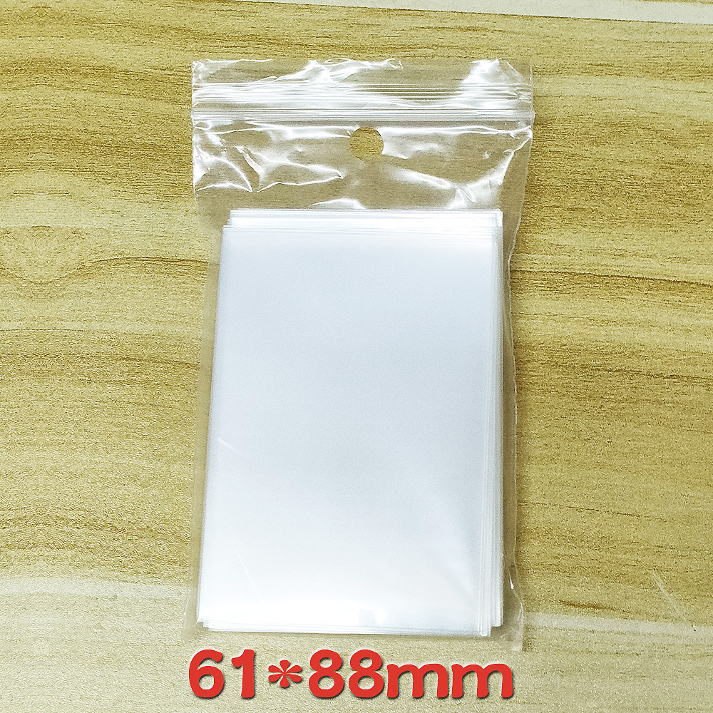 Venta al por mayor CPP transparente 20 tarjeta de seda película titular de la tarjeta gu ka tarjeta pequeña barra bolsa autoadhesiva bolsa de autosellado cubierta protectora palomitas de maíz