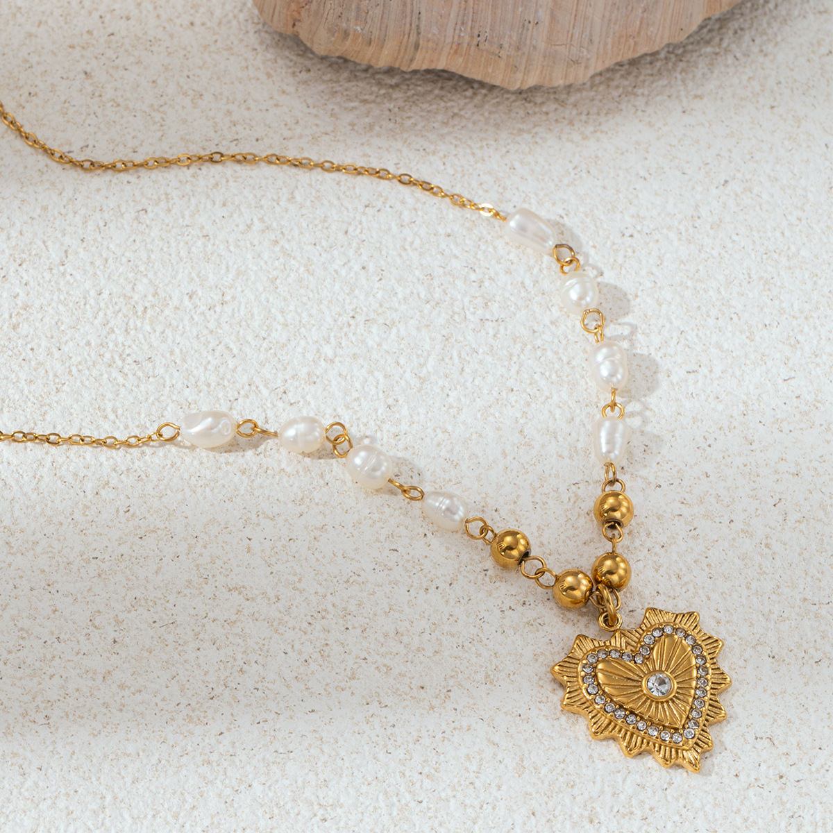 Collar de acero inoxidable de la UE y los Estados Unidos, lujo ligero, nicho universal, moda, amor, collar de perlas, joyería no desvanecida para mujeres