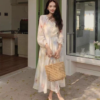 秋季温柔风印花V领泡泡长袖连衣裙女法式设计感修身茶歇仙女长裙