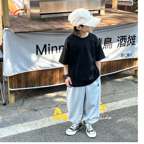 Children's short-sleeved solid color summer round neck t-shirt 100% cotton short-sleeved boys and girls loose western style t-shirt factory price