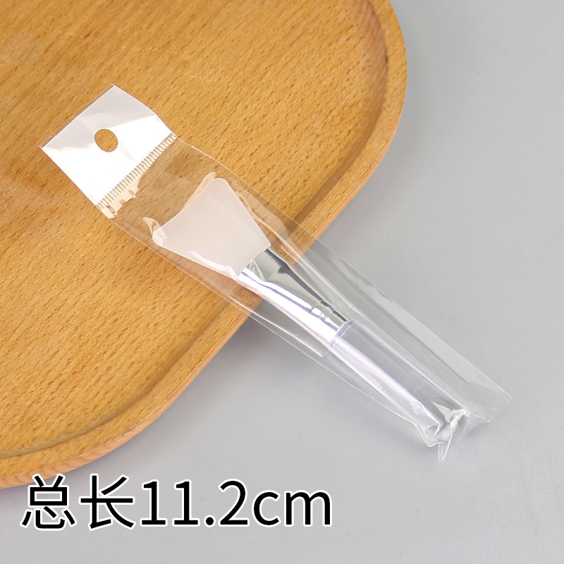 Transparent solid handle shovel-shaped soft rubber brush: Medium size