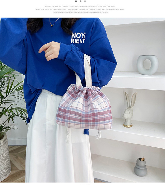 JK Japanese-style small bucket tote canvas bag, new simple and versatile, artistic single-shoulder hand-carry lunch box bag for women Application Scenario