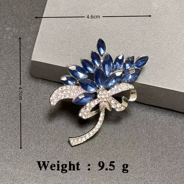 Bouquet of flowers with blue diamonds on silver background