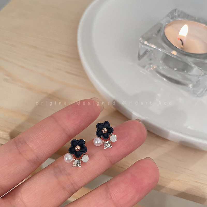 Diseño de nicho de alta gama borla larga sin orejas clip de oreja elegante estilo occidental de las mujeres cara-mirando pequeños nuevos pendientes de moda