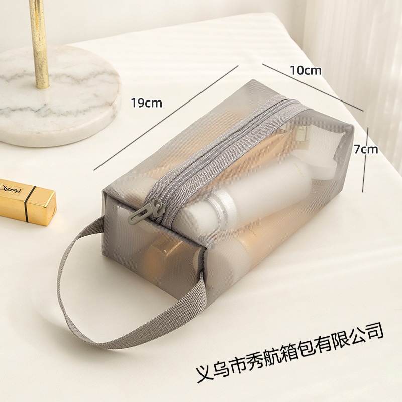 Nueva bolsa de cosméticos transparente de gran capacidad en el mercado, bolsa de lavado de viaje, bolsa de almacenamiento portátil de nailon portátil simple y portátil