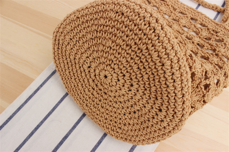 Women's Medium Cotton Rope Solid Color Vacation Beach Weave Bucket String Straw Bag display picture 9
