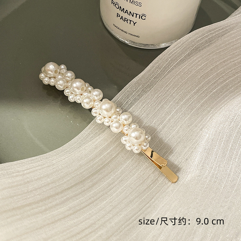 Corea del Sur clip para el cabello de perlas en línea clip para el cabello de mujeres rasgadas clip para el cabello de una palabra clip para el cabello de bordes fría BB clip lateral clip para el temperamento clip para la cabeza
