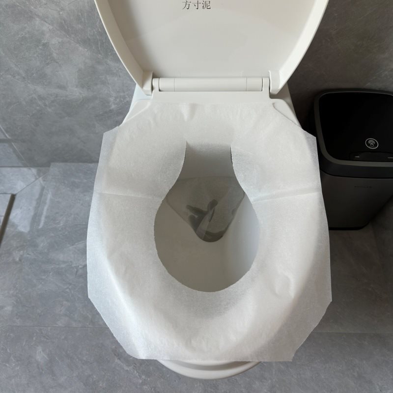 Exportación de gabinete de papel de inodoro desechable viaje de embalaje independiente cojín de inodoro hotel cubierta de inodoro comercial