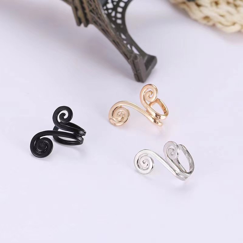 Japonés y coreano personalidad simple moda apretado aro Sun Wukong oreja clip Corea del Sur flor forma earless ear studs precio único