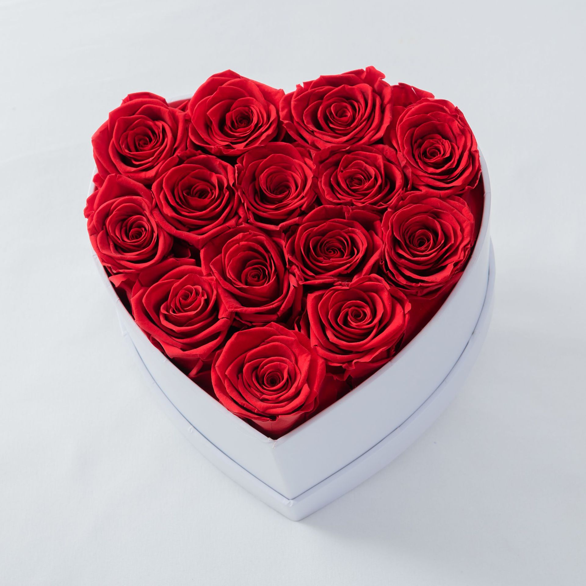 Caja corazón mediana 14 flores