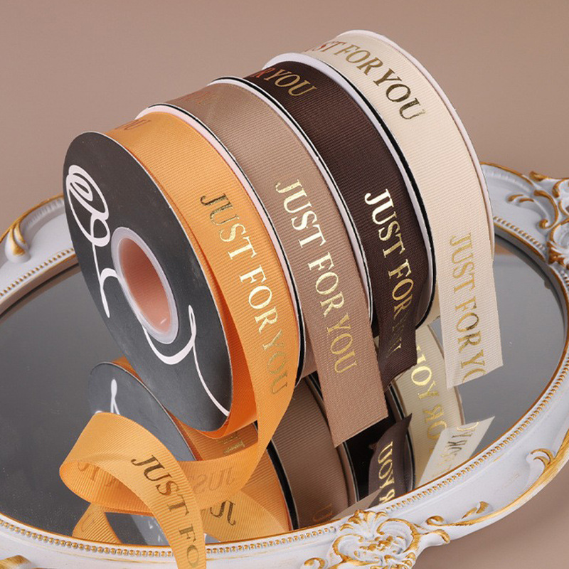 Al por mayor torta vinculante Cinta de seda arco color tira dorado inglés letras costilla cinta de embalaje de flores cinta