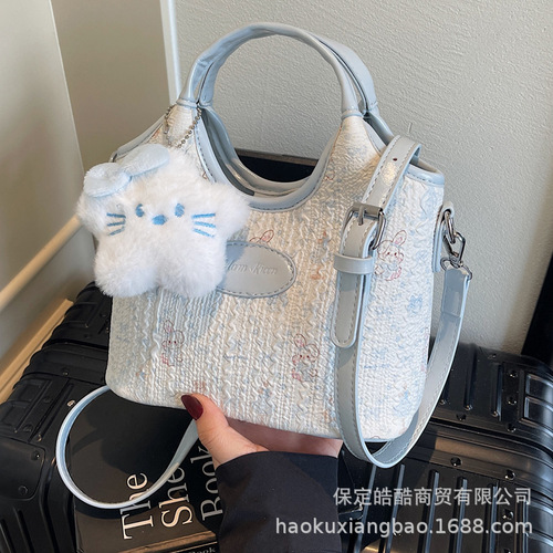 This year's popular women's 2025 new summer niche design crossbody bag with color block and water bucket style