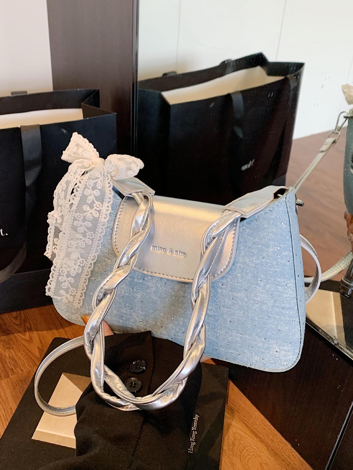 Bolso de moda coreano de estilo extranjero bolso de mano mujer 2025 verano nuevo bolso de brazo de denim bolso de viaje