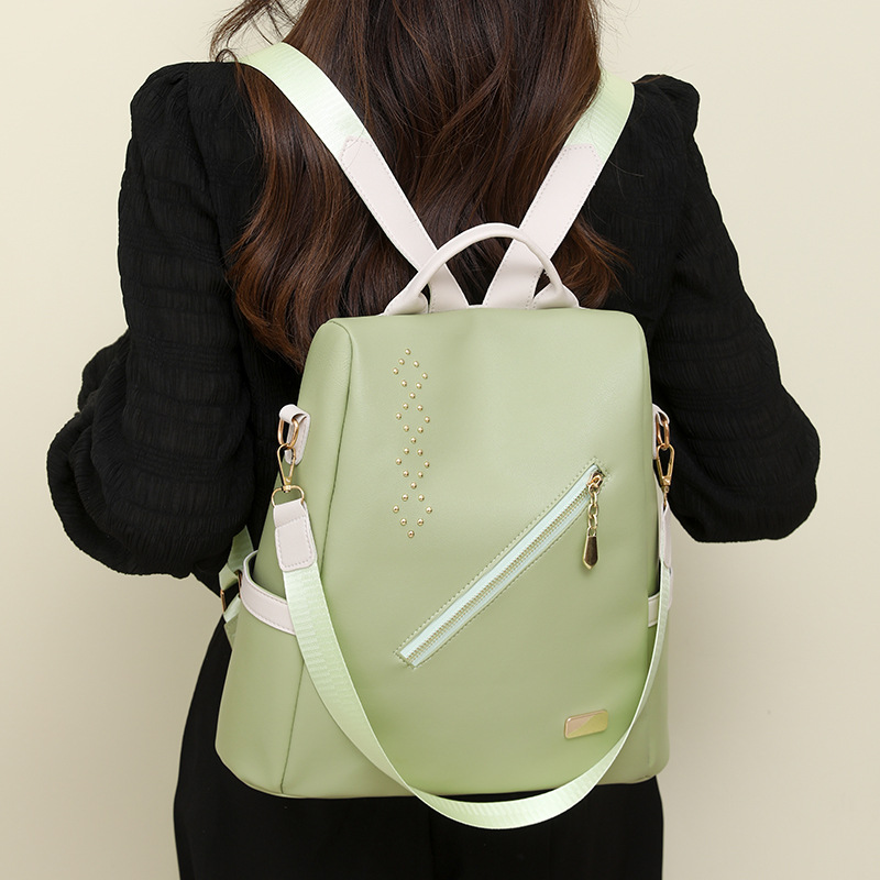 Mochila de cuero suave para mujer antirrobo transfronteriza 2024 nueva mochila de viaje al aire libre para jugar práctica mochila escolar de gran capacidad