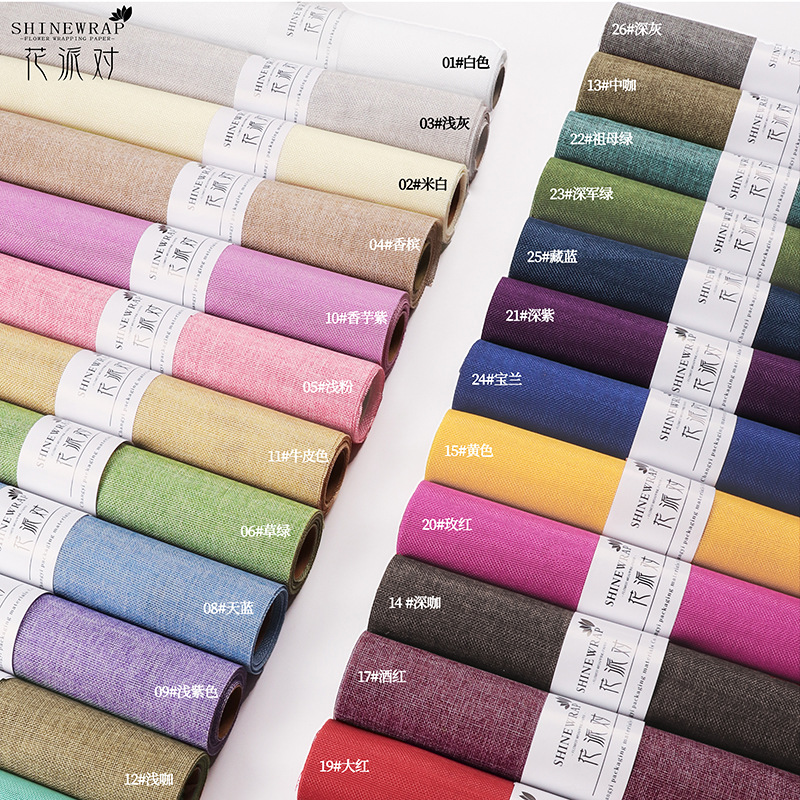 Fábrica de fiestas de flores al por mayor de color sólido enrollar hilo de red flor envasado tela de red florista ramo de flores envasado hilo de red colorido lino rollo