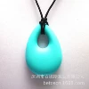 Turquoise green teether drop-shaped