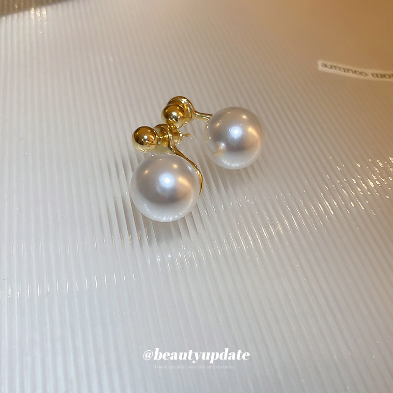 Pendientes de perlas de aguja de plata galvanizada de oro genuino francés Retro Luz de lujo de alto grado pendientes elegantes pendientes de temperamento al por mayor para las mujeres