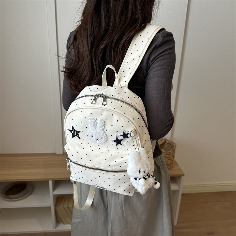 Mochila de estudiantes casuales coreana para mujeres 2026 nueva mochila de nicho de diseño de dibujos animados encantadora personalidad mochila