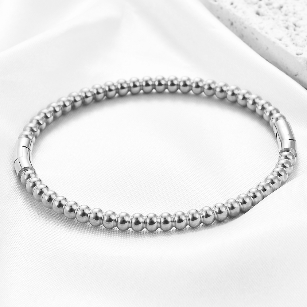 Minimalistisk guldfarvet bambu armbånd i rustfrit stål_voghion.com