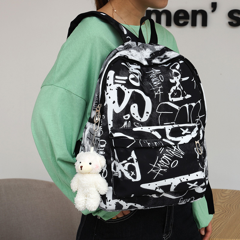 Nuevo estudiante de secundaria mochila personalizada carta graffiti mochila pareja de gran capacidad mochila bolso de viaje moda