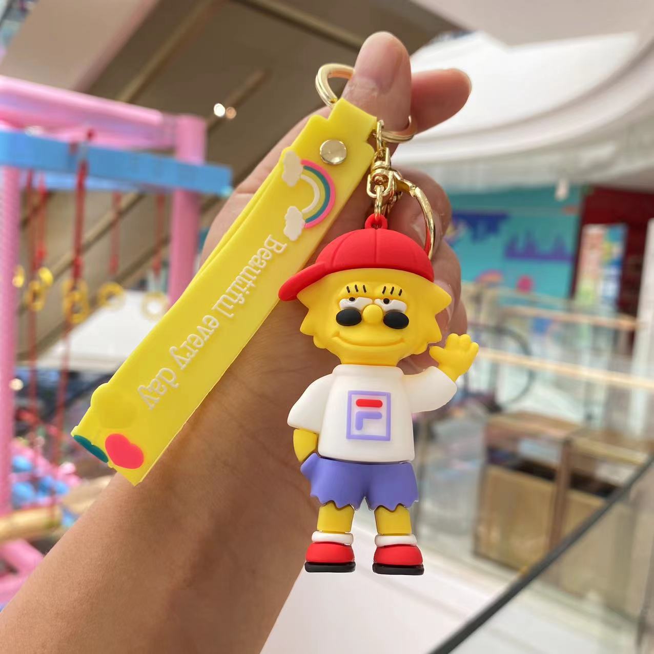 Cross-border Simpson llavero de dibujos animados muñeca pareja bolsa Coche colgante muñeca máquina muñeca pequeño regalo al por mayor